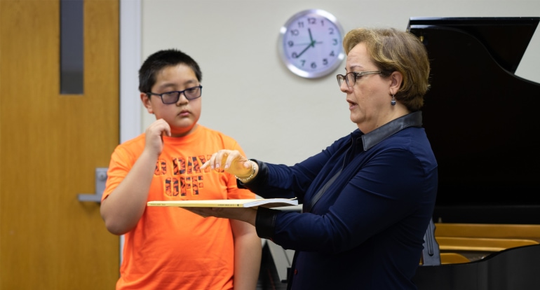 Piano student and teacher